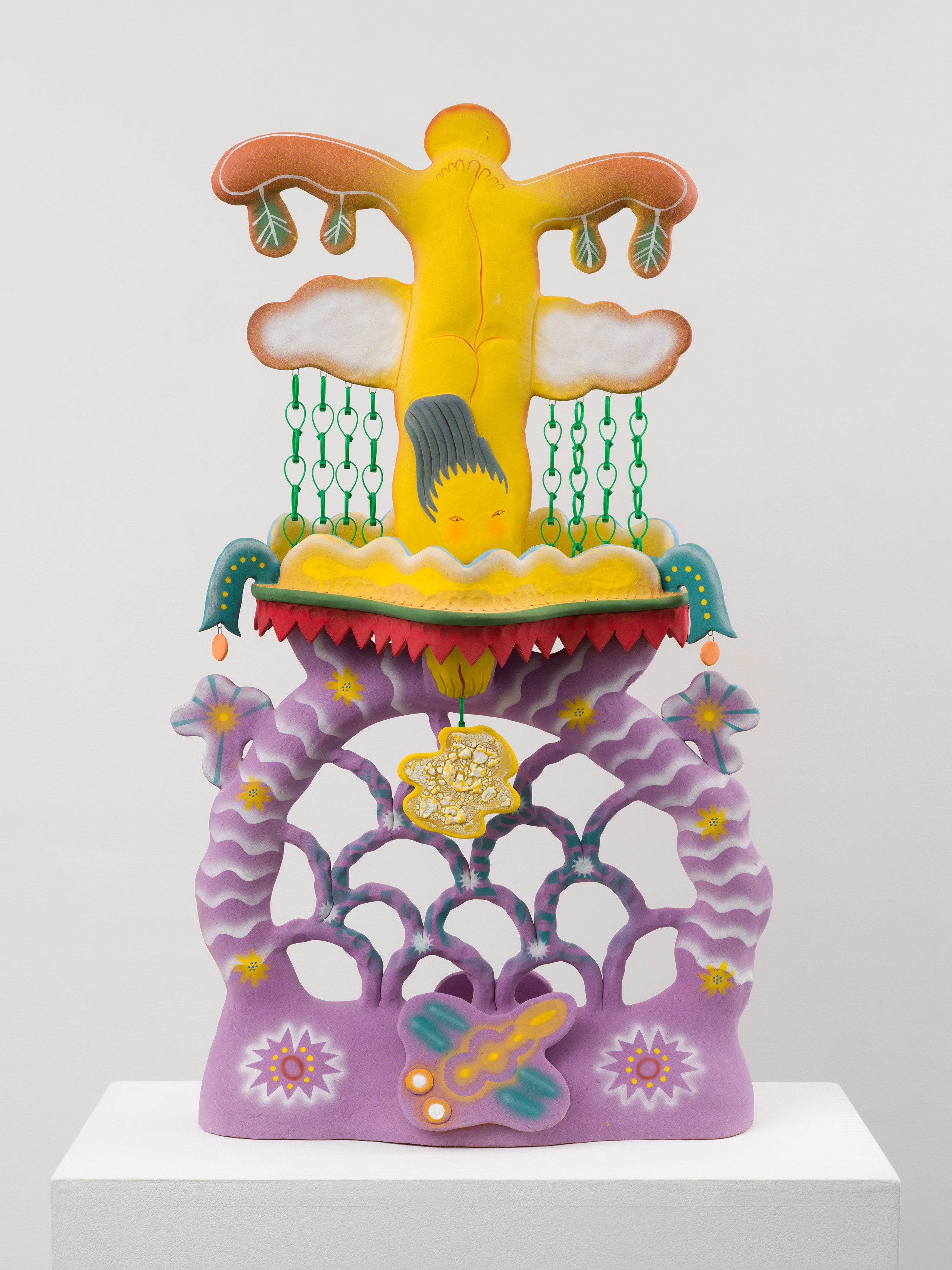Ceramic sculpture by Chenlou Hou, abstracted representation in soft tones of lavender, yellow, and teal of the title "A long-haired figure diving into the water to grasp the reflection of the moon" 