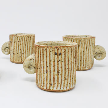 three mugs on a white background 