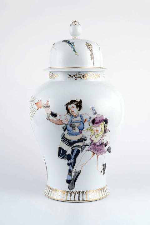 Urn decorated with images of female action heroes