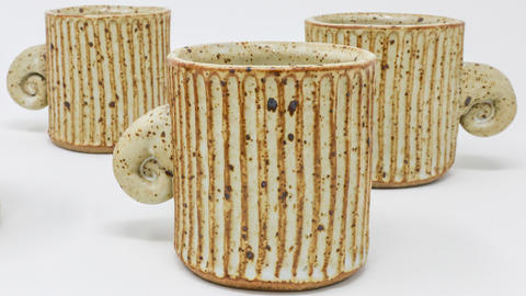 three mugs on a white background 