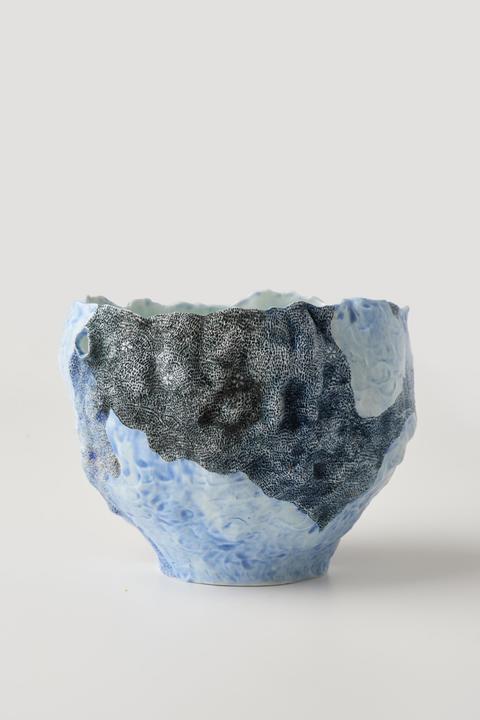 Porcelain cup by Lily Fein - pale blue pinched vessel with fine pattern of tiny black marks across the surface