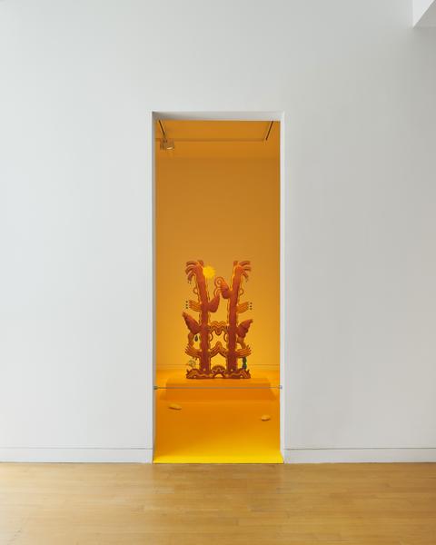sculpture viewed through a doorway